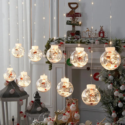 Christmas curtain light set with 10 fairy ball lamps showing snowman, wishing ball and Christmas tree designs