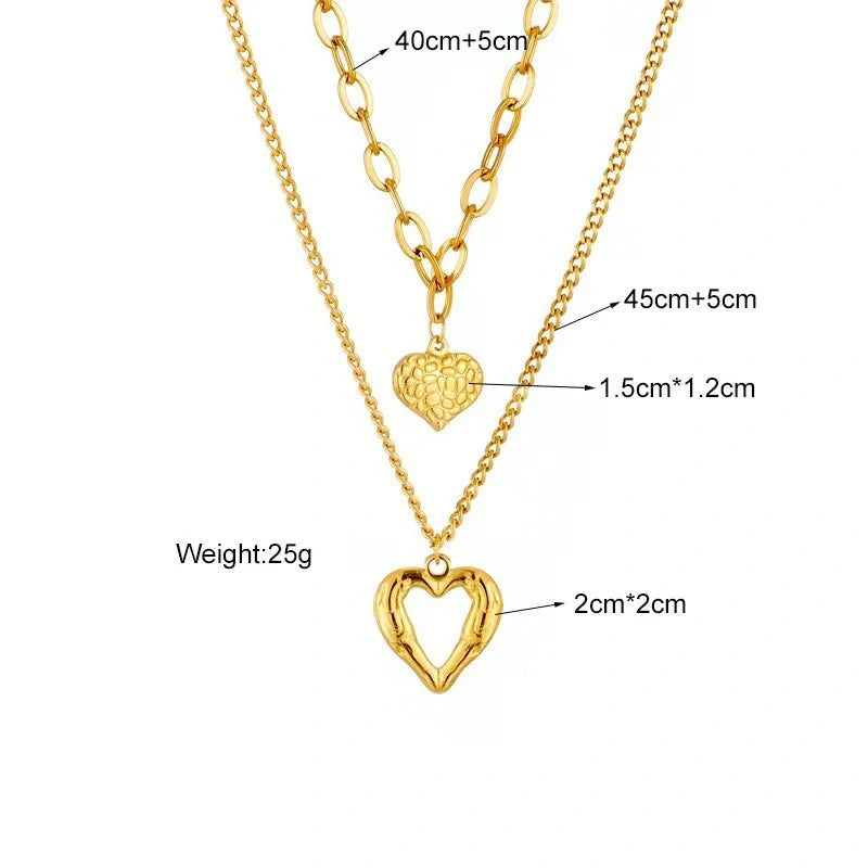 Stylish Titanium Steel Angel Wings Heart Necklace for Women in silver and golden finishes.