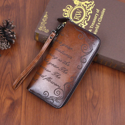 Premium leather clutch bag with hand-brushed finish, featuring multiple interior compartments for convenient organization