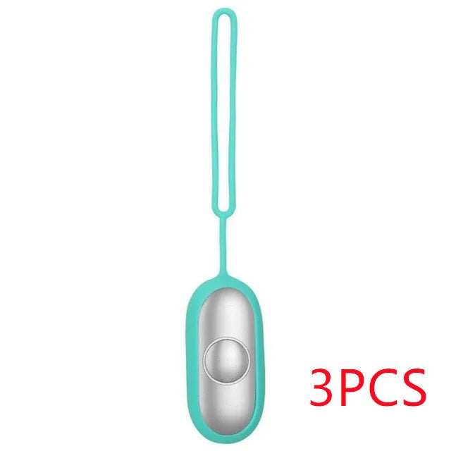 Hand-held micro-current sleep aid device in grey, green, and orange colour options