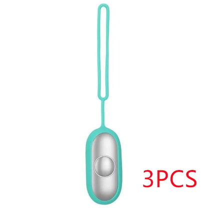 Hand-held micro-current sleep aid device in grey, green, and orange colour options