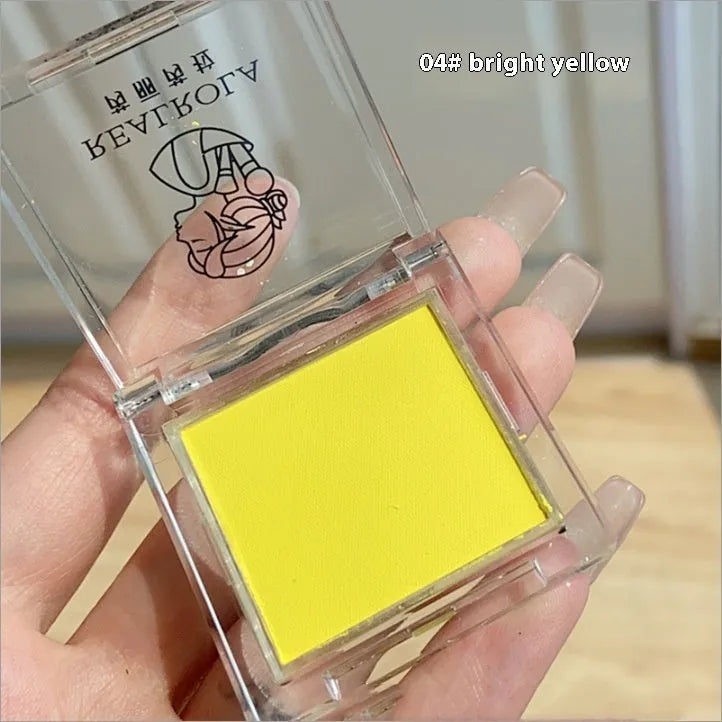 Bright yellow matte eyeshadow single pan with 2g net content for monochrome makeup application