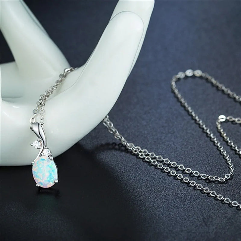 Opal pendant necklace featuring a water drop shape with electroplated alloy construction in rose gold or white, complete with an adjustable O-shaped chain from 21cm to 50cm for versatile wear in simple European and American styles.