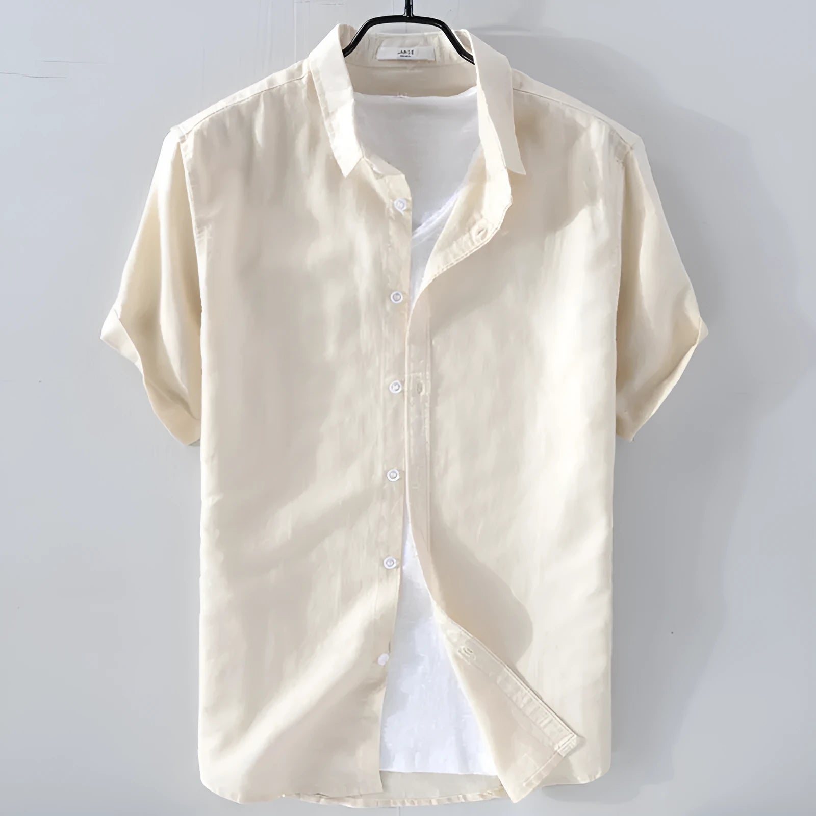 Men's light blue short sleeve linen blend casual shirt with a loose fit.