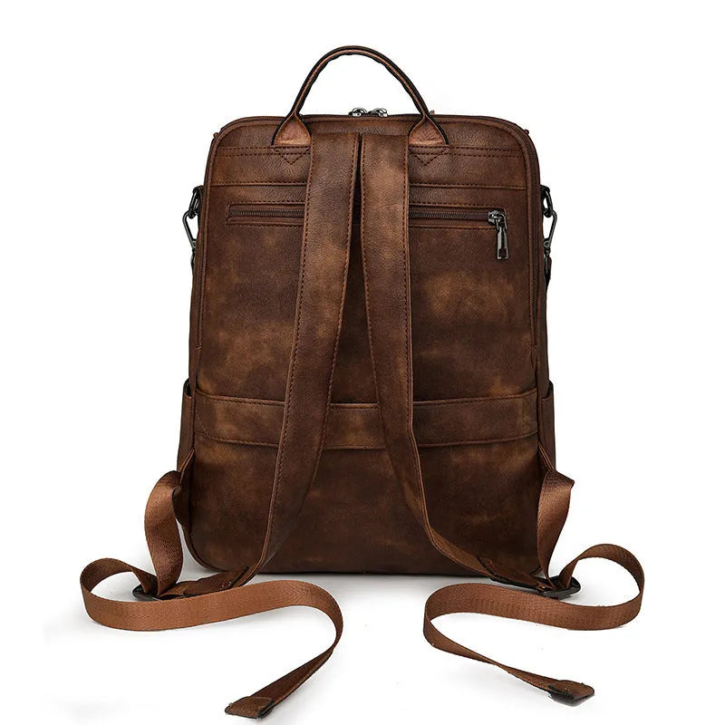 Retro college student backpack with curved shoulder straps in multiple colour options including black, blue, and yellow apricot