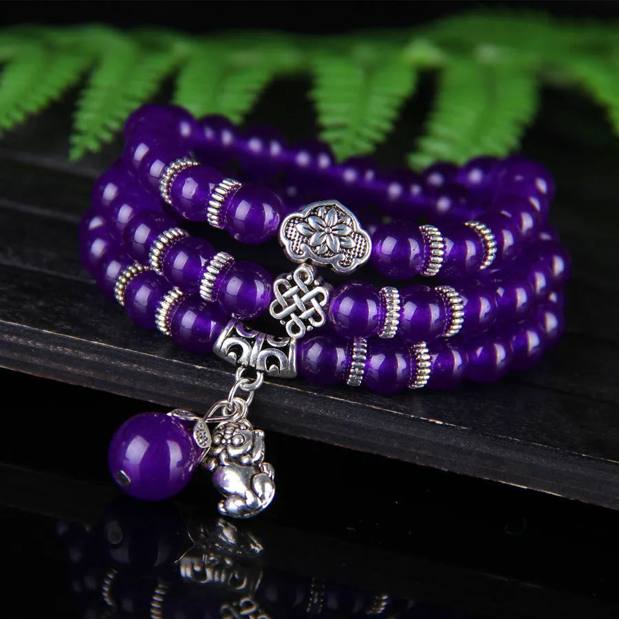 Purple chalcedony natural crystal bracelet with three-circle ethnic design on elastic cord