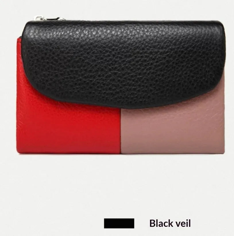 Women's short wallet in soft leather texture with solid colour and stitching detail, urban minimalist style
