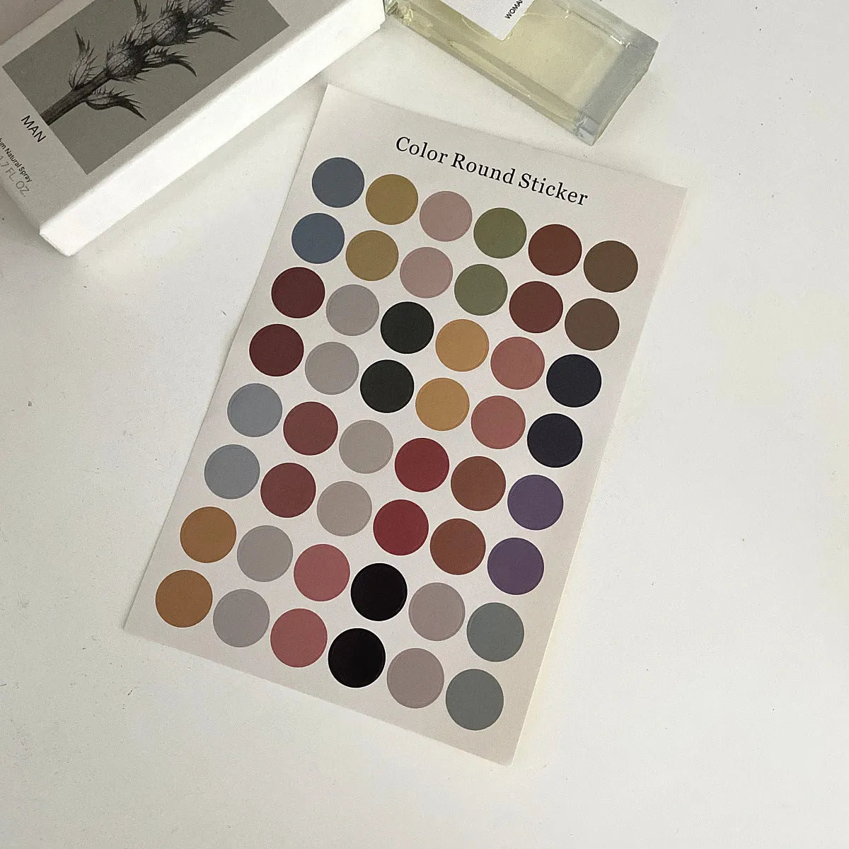 Sheet of 48 round Morandi colour polka dot stickers for marking planner pages.