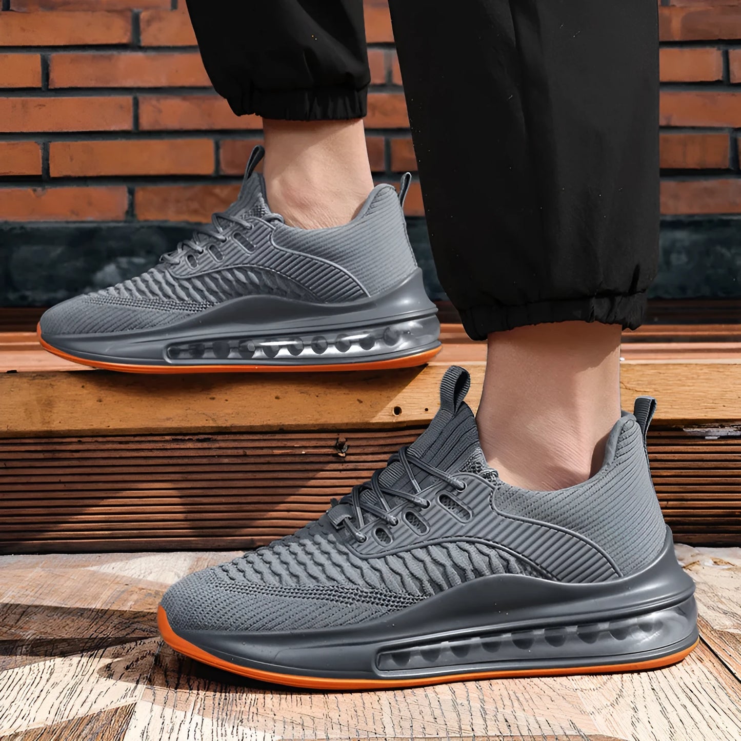Men's black low-top mesh running shoes with lace-up front and platform sole.