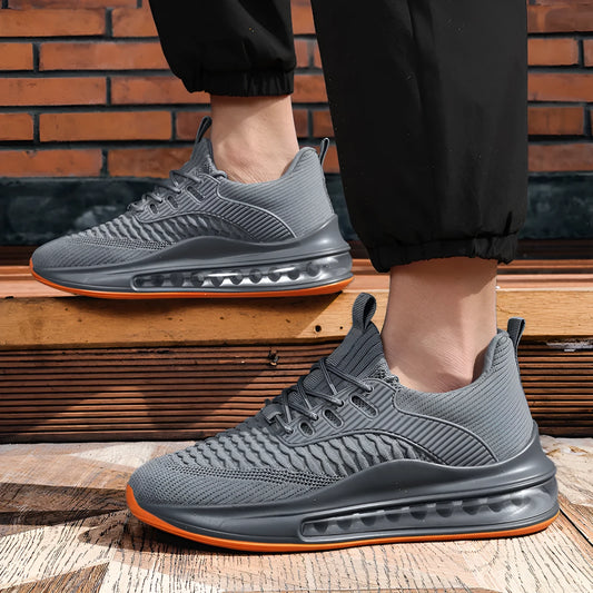 Men's black low-top mesh running shoes with lace-up front and platform sole.