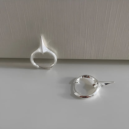 Geometric star-shaped ear clip for women in a platinum electroplated finish.