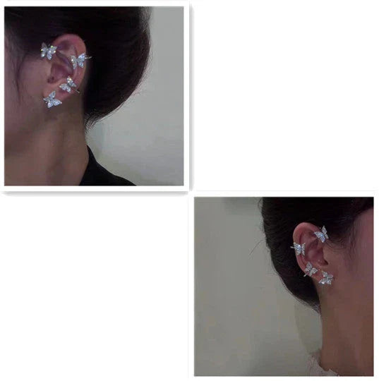 Fashionable butterfly-shaped ear clips in gold and silver tones, showcasing a chic, European-inspired design.