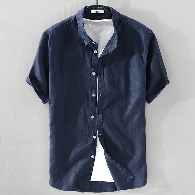 Men's light blue short sleeve linen blend casual shirt with a loose fit.