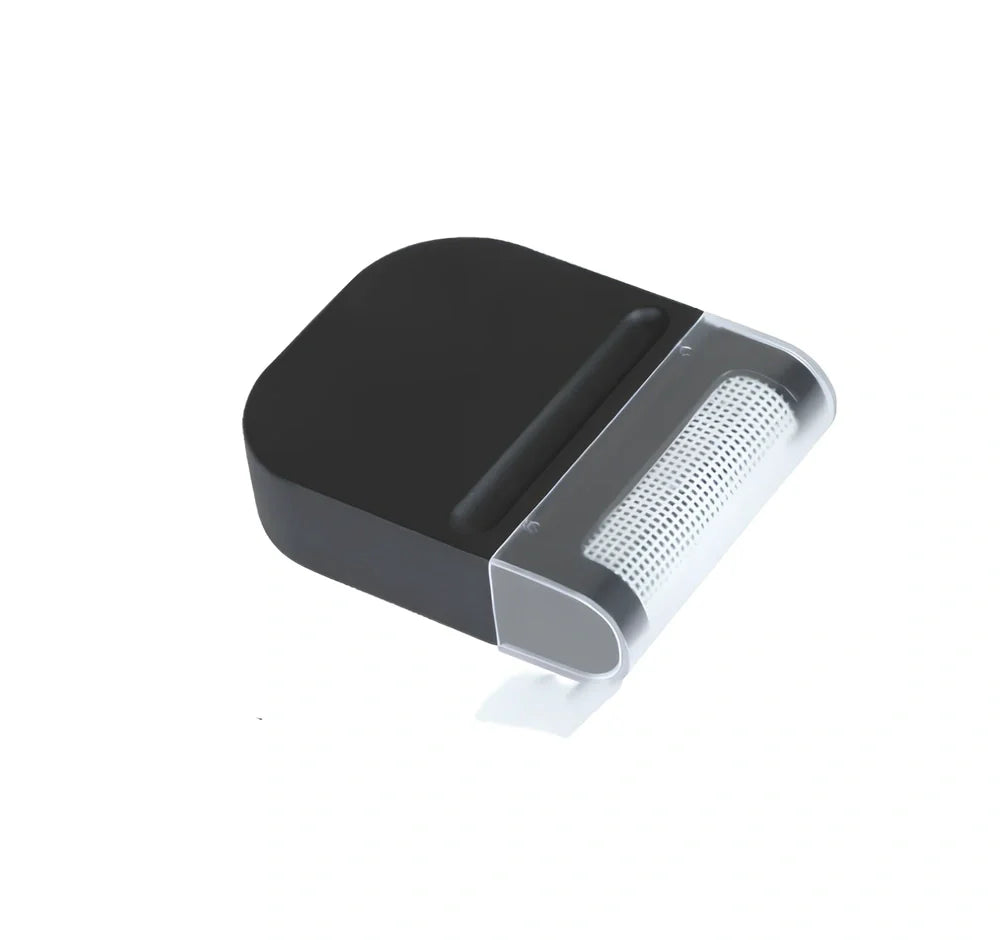 Portable manual fabric cleaning brush with removable catching net, 6.4 cm wide plastic construction