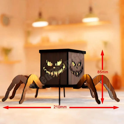 Wooden Halloween spider lantern candlestick with cut-out designs, shown next to a candle.