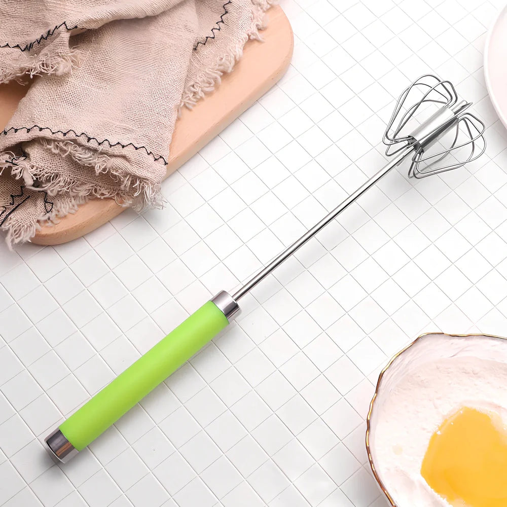 Self-spinning whisk with straight stainless steel design and black handle in multiple colours