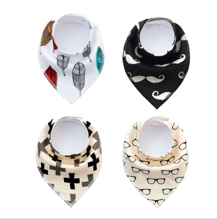 Stylish baby bibs and burp cloths featuring trendy arrow, wave, and triangle designs in soft, absorbent cotton