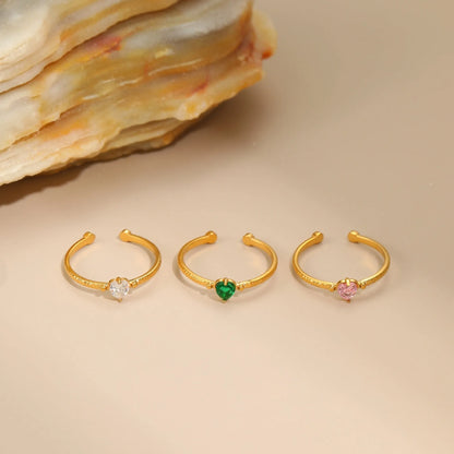 Open-ended stainless steel ring with geometric love heart shape and inlaid green zircon stone.