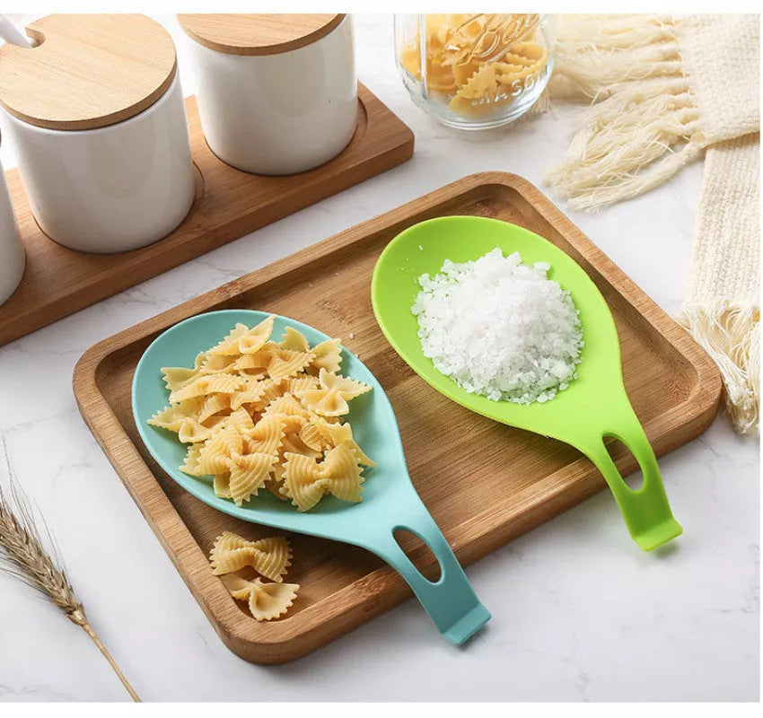 TPE silicone spoon mat in various colors for kitchen heat insulation and easy cleaning