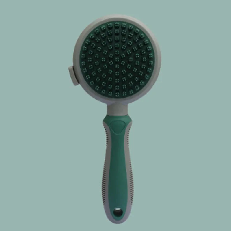 Green and pink two-sided pet brush showing retractable slicker bristles and silicone massage nubs on a white background.