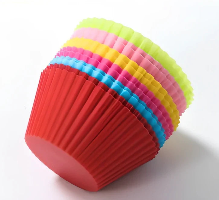 Six different coloured silicone cupcake liners showing fluted edges and nonstick surface