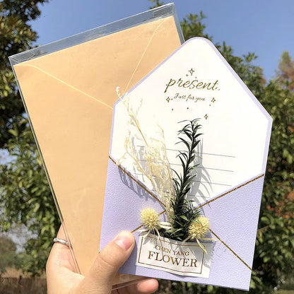 Handmade 3D pop-up greeting card with butterfly shape showing artificial flowers and hot stamping details