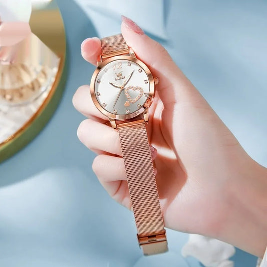 Women's fashion watch with rose alloy case and mesh strap, showing dial colour options: black, blue, green, pink, red, white.