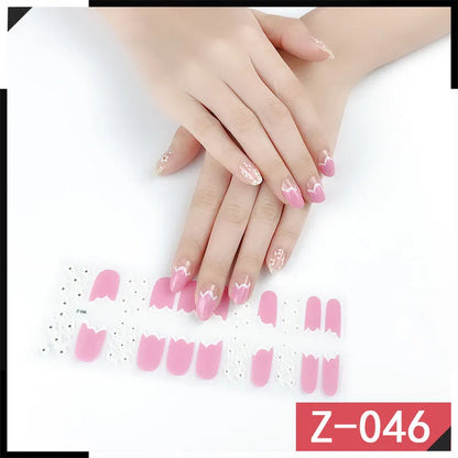 Korean nail stickers sheet showing cartoon, flower, and strawberry patterns with a nail file.