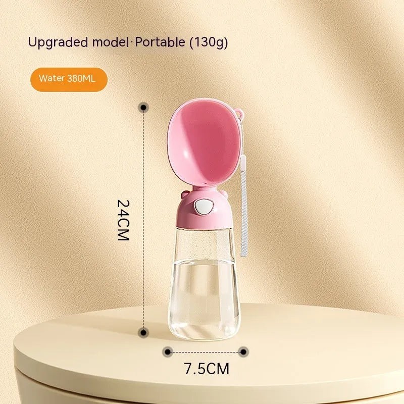 Portable dog water bottle with feeder bowl in brown, pink, or yellow colours for outdoor pet travel