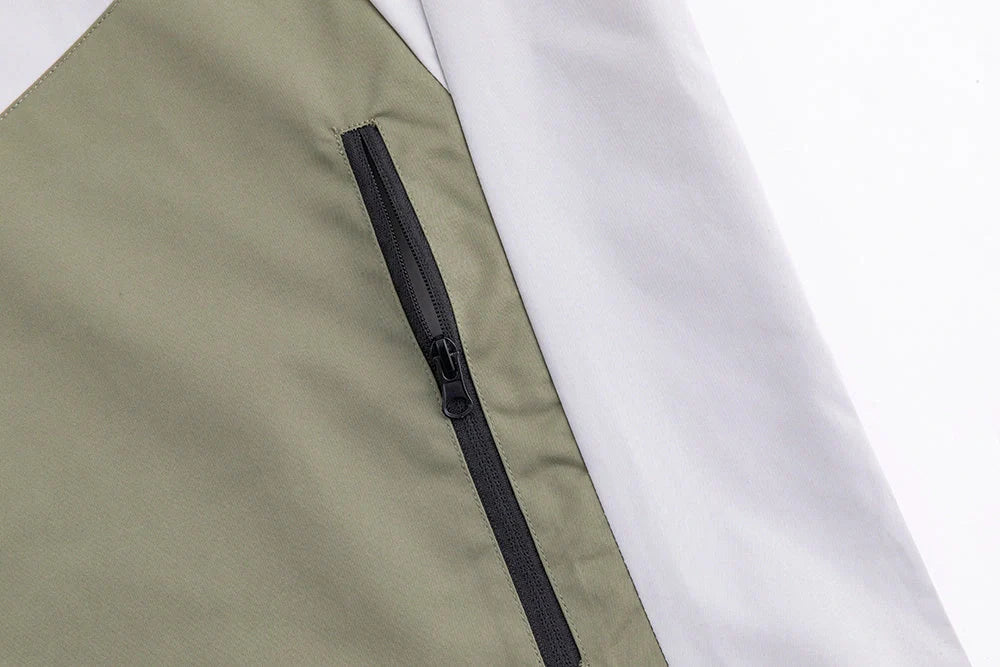 Military Green Assault Suit for outdoor adventures, durable and comfortable with multiple pockets.