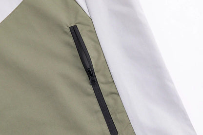 Military Green Assault Suit for outdoor adventures, durable and comfortable with multiple pockets.