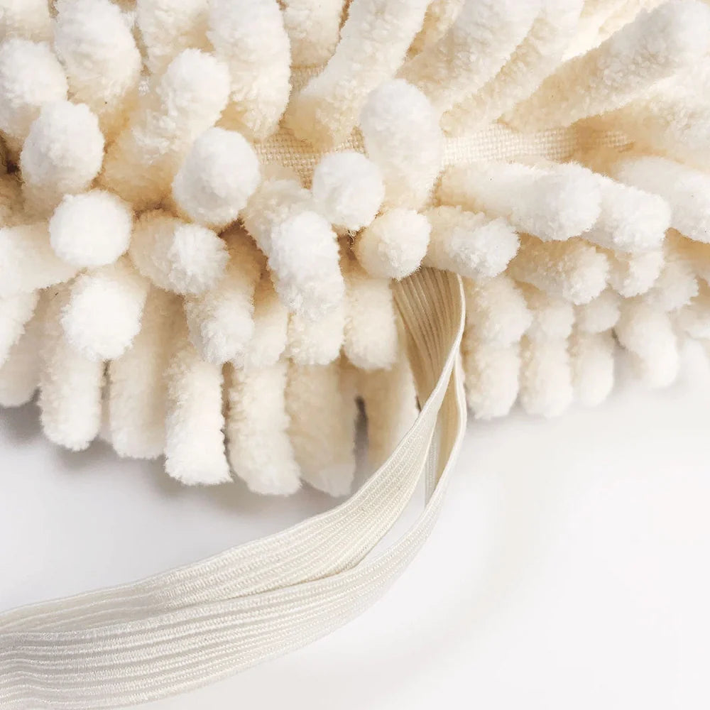 Beige chenille hanging hand towel with integrated loop for quick drying