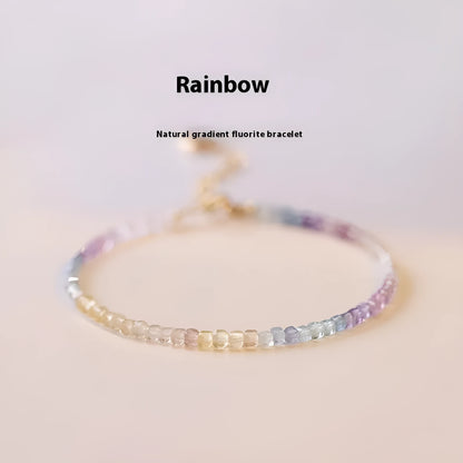 Women's handmade bracelet with rainbow fluorite stones in copper geometric quadrilateral settings