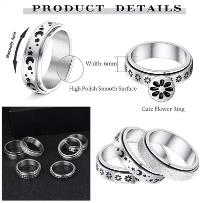 Stainless steel spinner ring with intricate moon and stars design