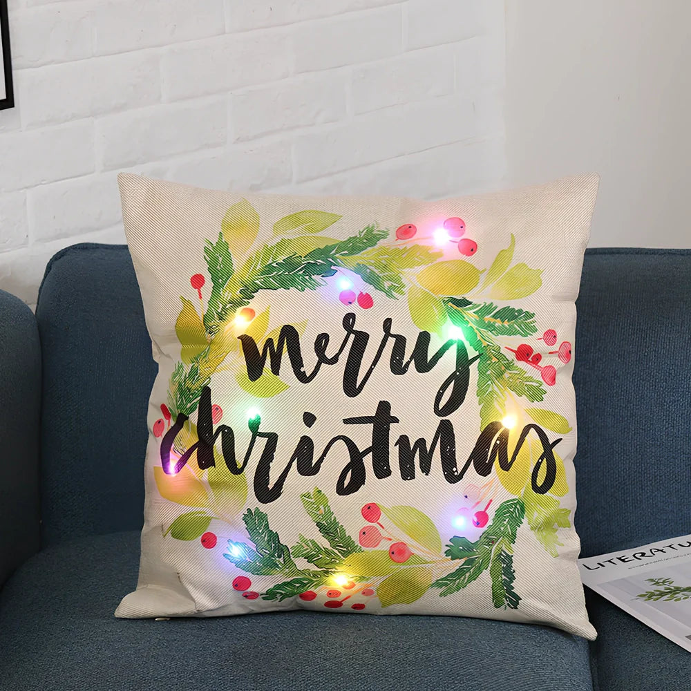 45cm square Christmas cushion with linen cover and battery-operated lighting showing festive design
