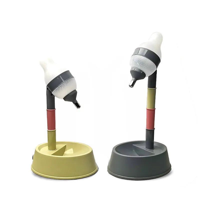 Adjustable height all-in-one pet waterer and feeder for cats and dogs, shown in grey or pink