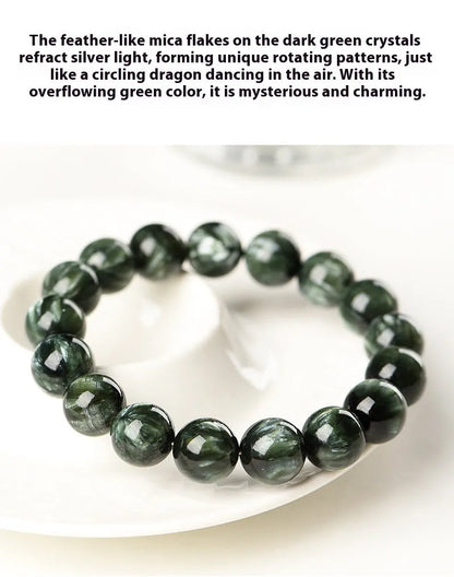 Green Dragon Crystal bracelet with 8-9mm geometry beads and Ruyi elements on wrist