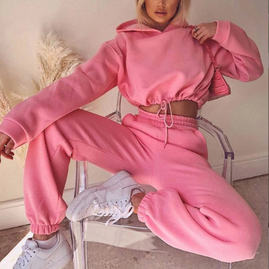 Stylish and comfortable 2-piece tracksuit set for women featuring a hoodie and relaxed-fit pants in a variety of vibrant colors