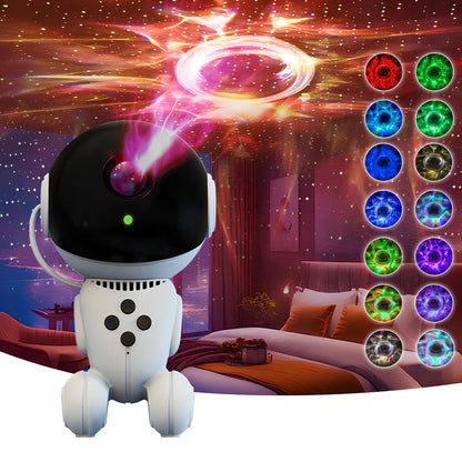 White robot-shaped star light projection lamp with USB cable and remote control on table