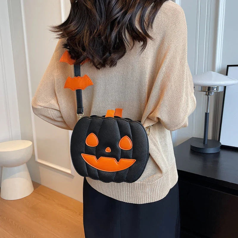 Stylish Halloween crossbody bag with pumpkin cartoon and bat design, available in multiple vibrant colors