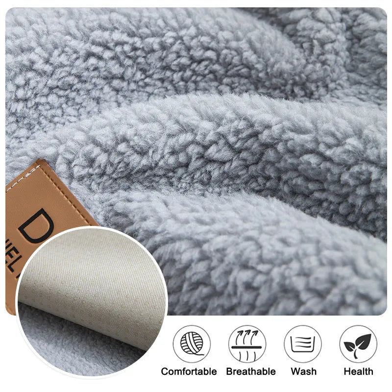 Beige lamb wool plush sofa cover with anti-slip backing on a grey fabric sofa.