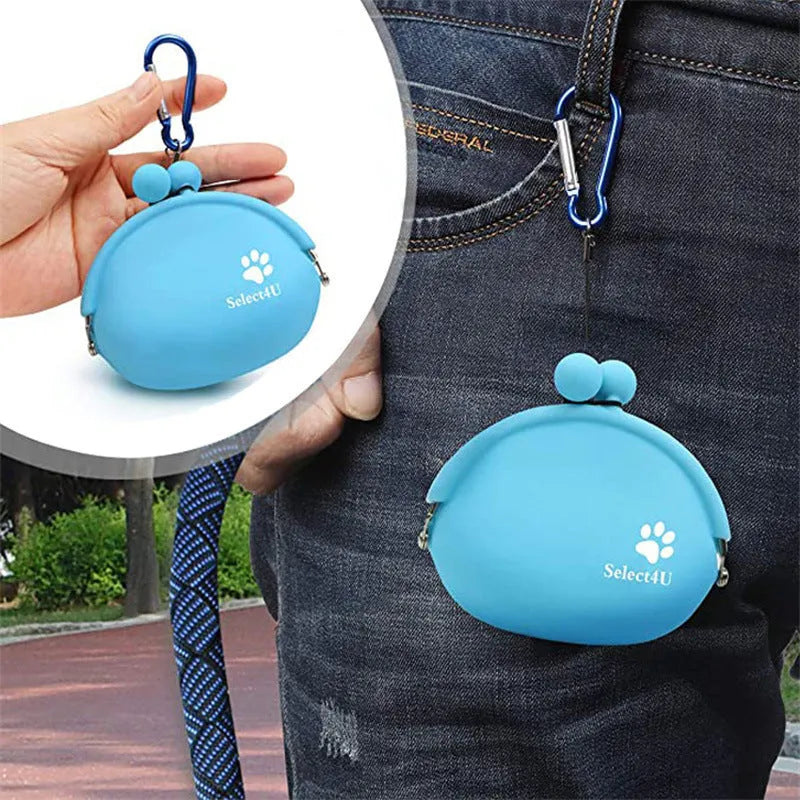 Yellow silicone dog training treat pouch with a black hook and loop waist strap, shown with dog biscuits.