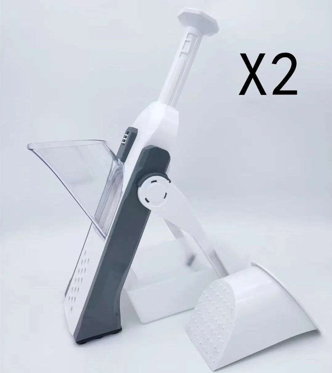 White and blue multifunctional vegetable slicer with stainless steel blades on a kitchen counter.