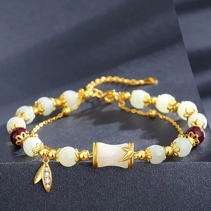 Retro bracelet with Ruyi flower design in glass and coloured glaze beads with electroplated accents