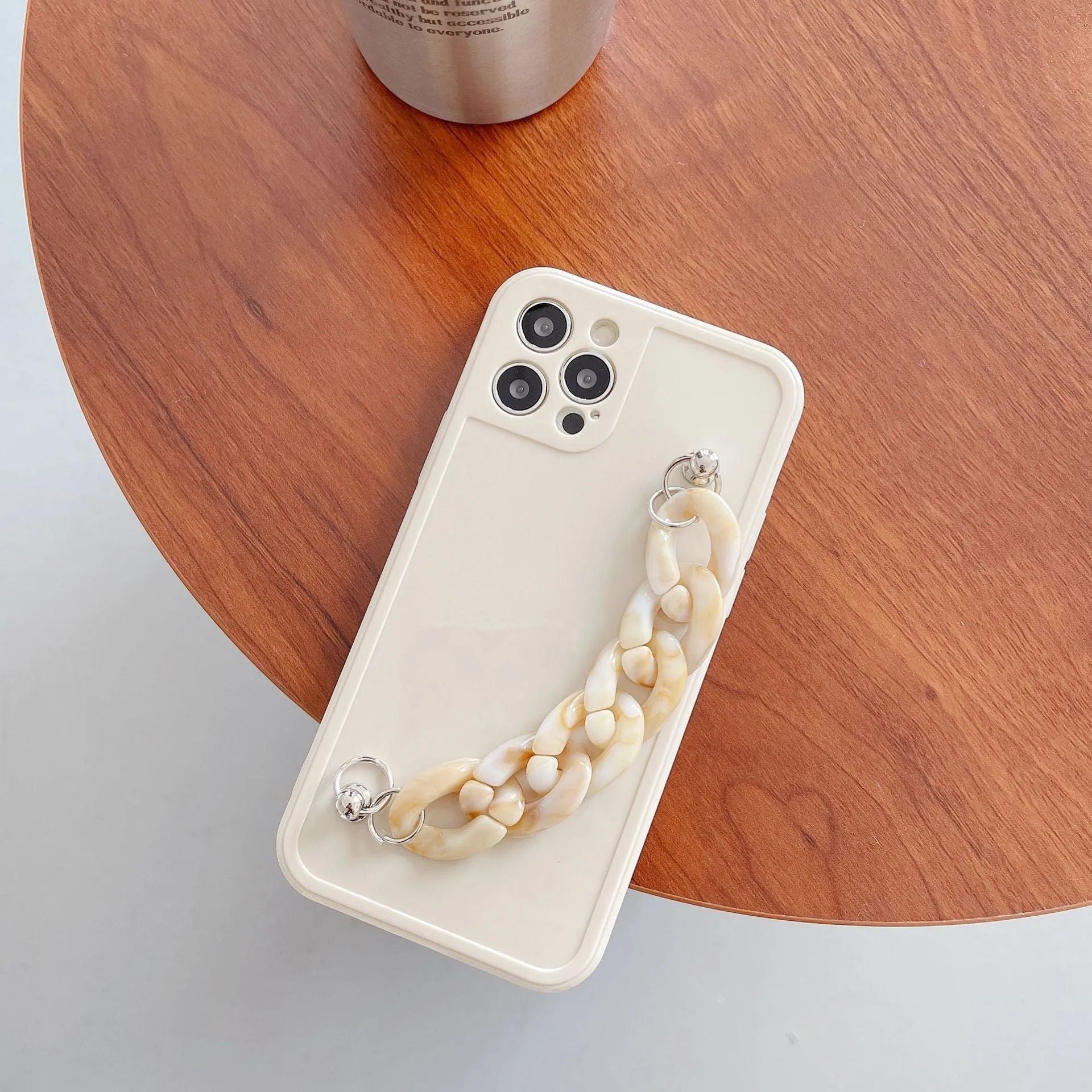 Silicone iPhone case with marble bracelet pattern and side lanyard hole in grey blue colour.