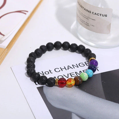 Handcrafted black lava beaded bracelet with seven chakra stones for healing and balance