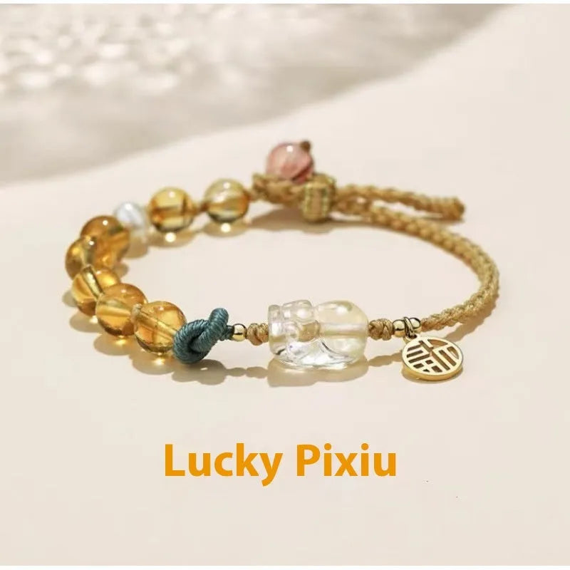 Hand-woven citrine crystal bracelet with animal zodiac designs in natural unisex style
