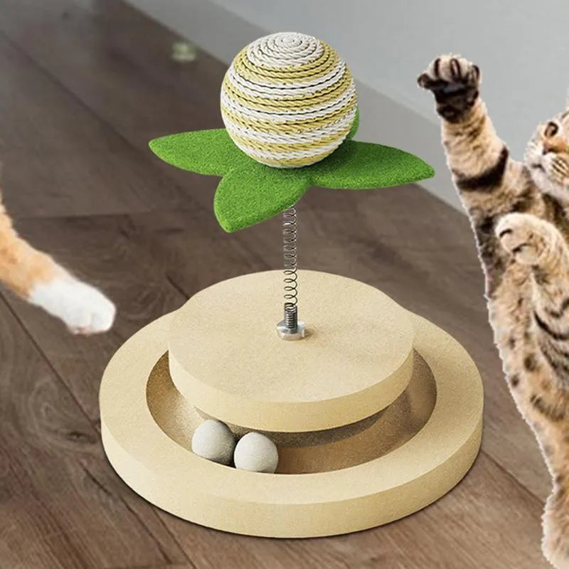 Green sisal scratching pad cat toy with rotating ball track and spring elements for indoor feline play