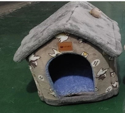A cozy and comfortable pet bed with a self-warming fabric, durable non-slip base, and removable machine-washable cover