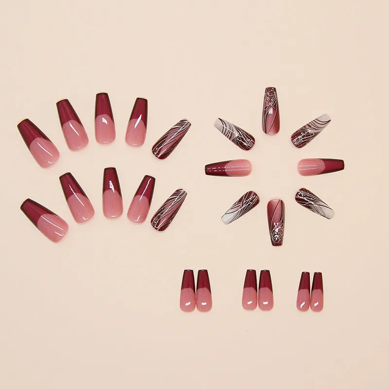 Set of 24 French line design fake nail stickers and one tube of adhesive glue on a white background.
